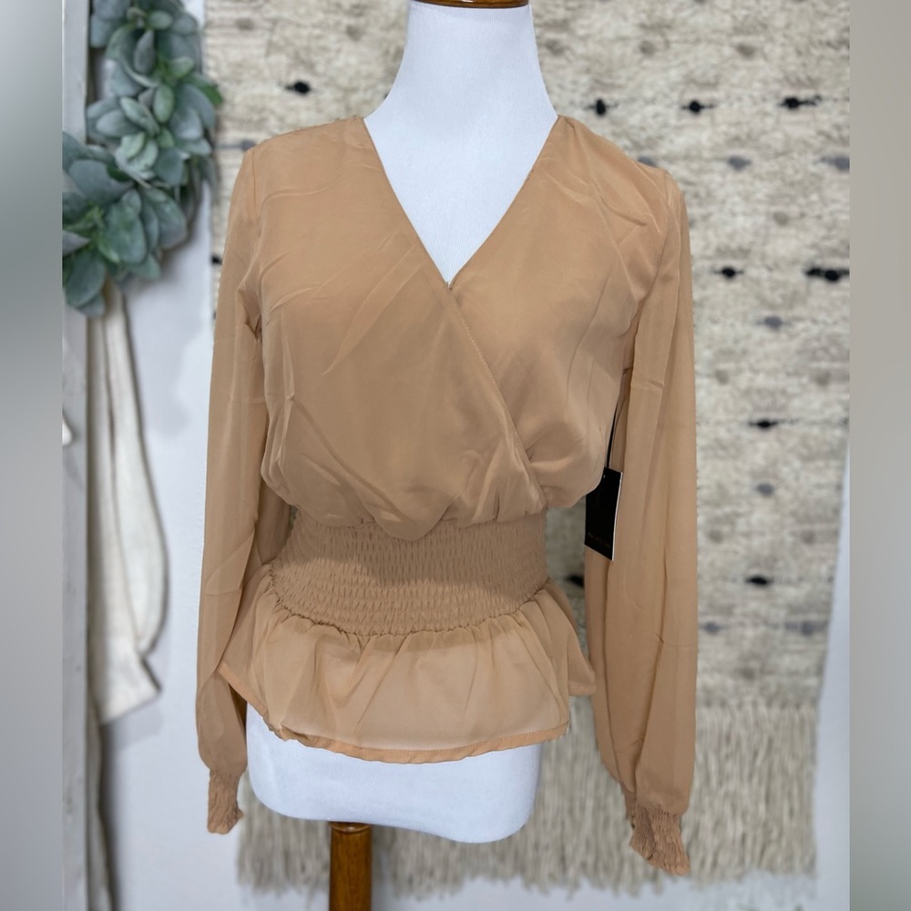 NWT Japan tan vneck blouse. Cinched waist with slight peplum. Size xs.